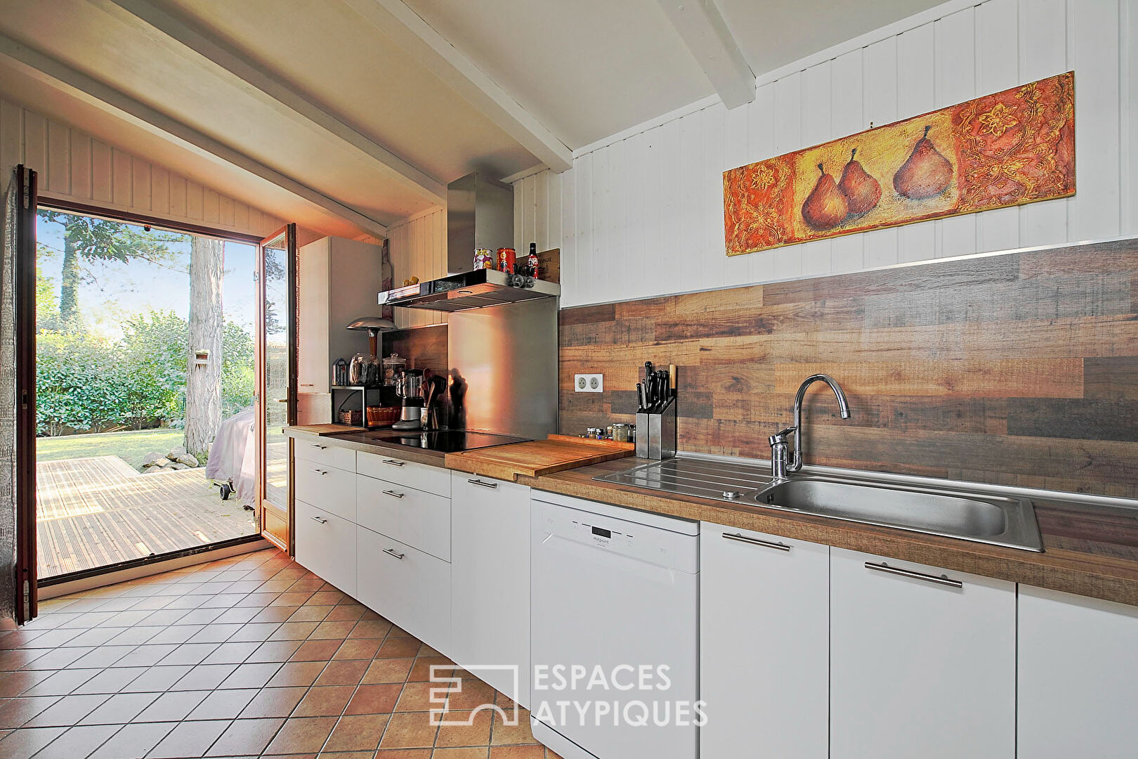 Maison en bois avec terrasse xxl et son jardin