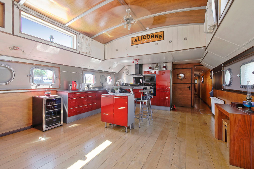 Renovated sailing barge with two terraces