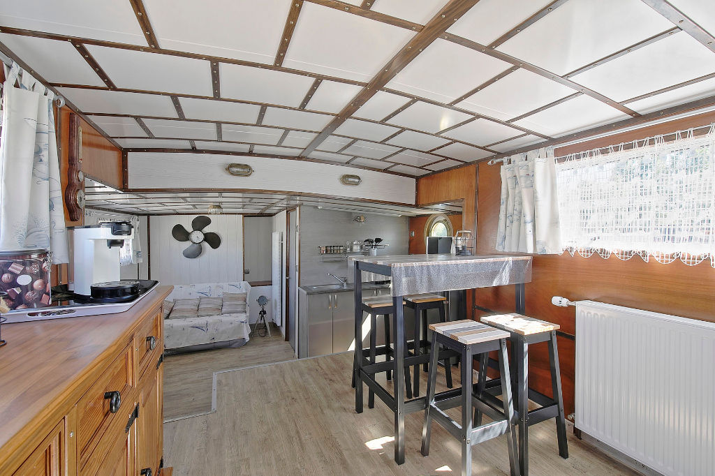 Renovated sailing barge with two terraces