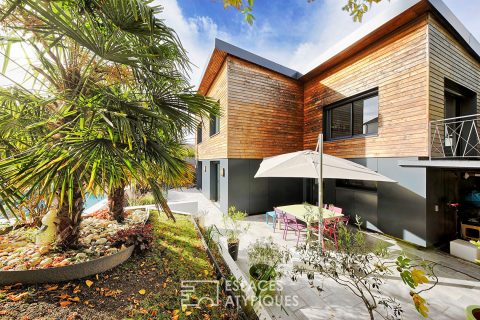 Contemporary house with swimming pool and garden