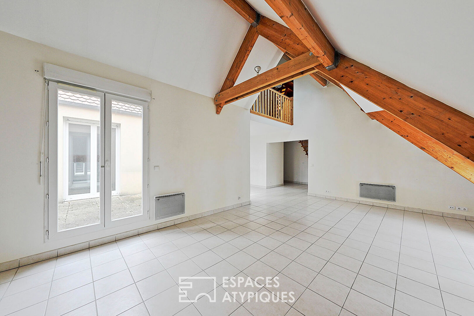 Appartement en duplex avec terrasse et balcon en centre-ville