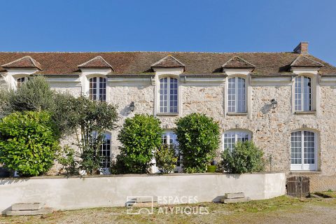 Old farmhouse with garden and outbuildings