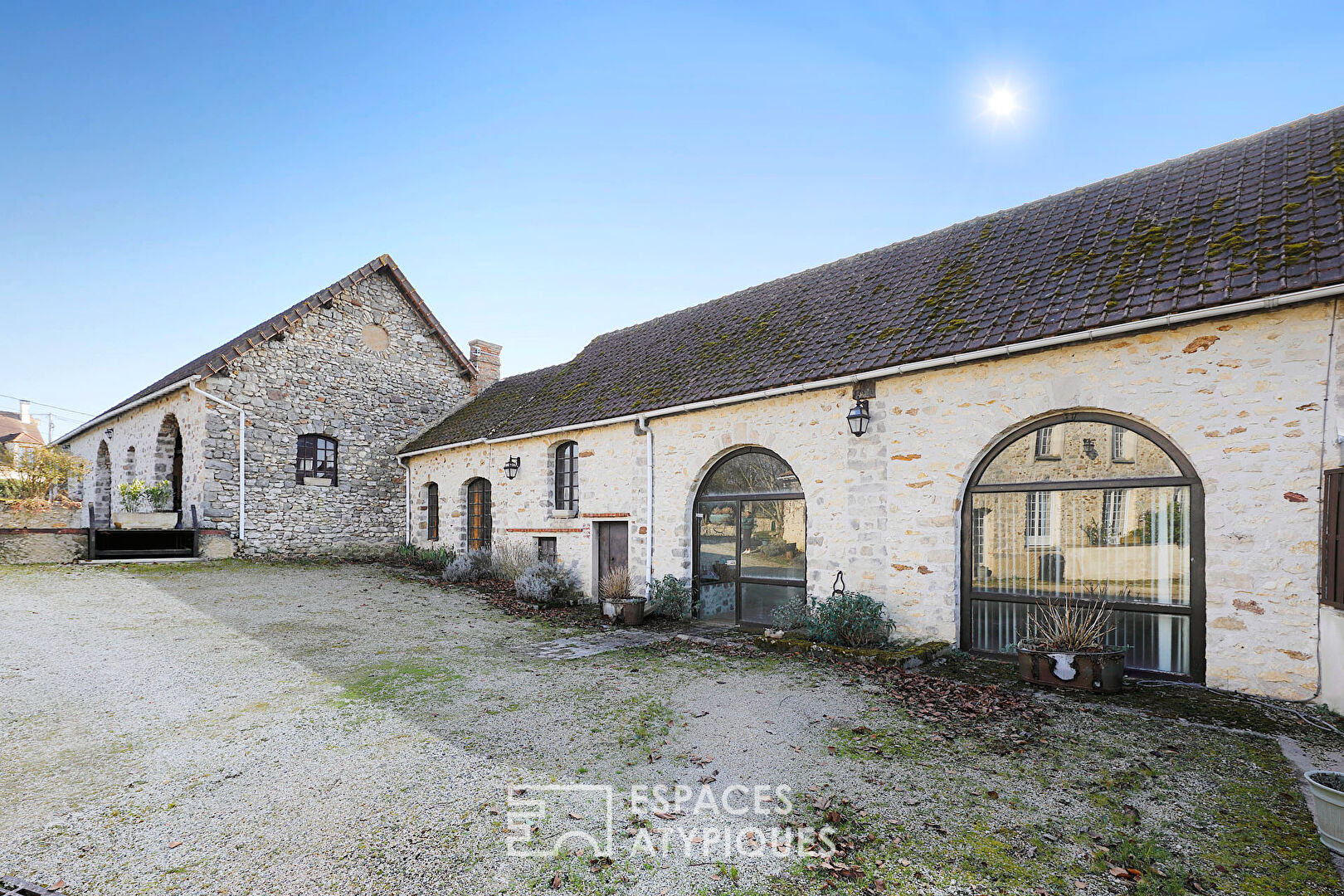 Old farmhouse with garden and outbuildings