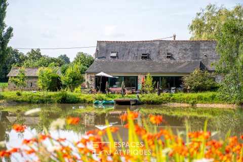 The authentic farmhouse and its pond