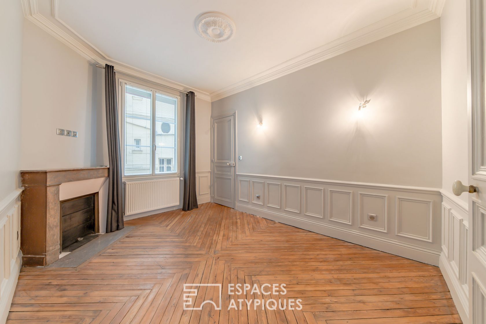 Haussmannian renovated in the heart of the historic district