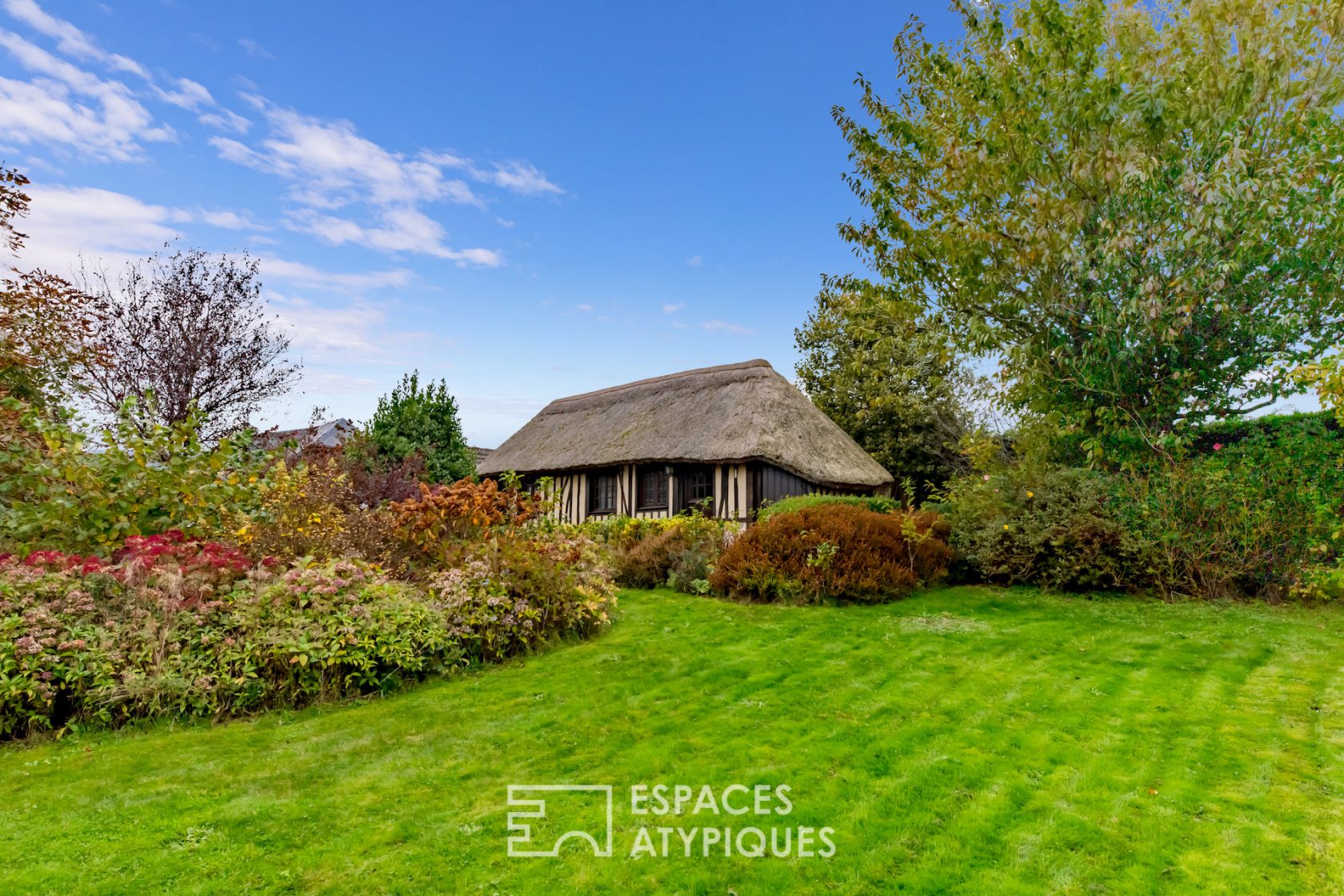 Authentic thatched cottage with its renovated cottage near the coast