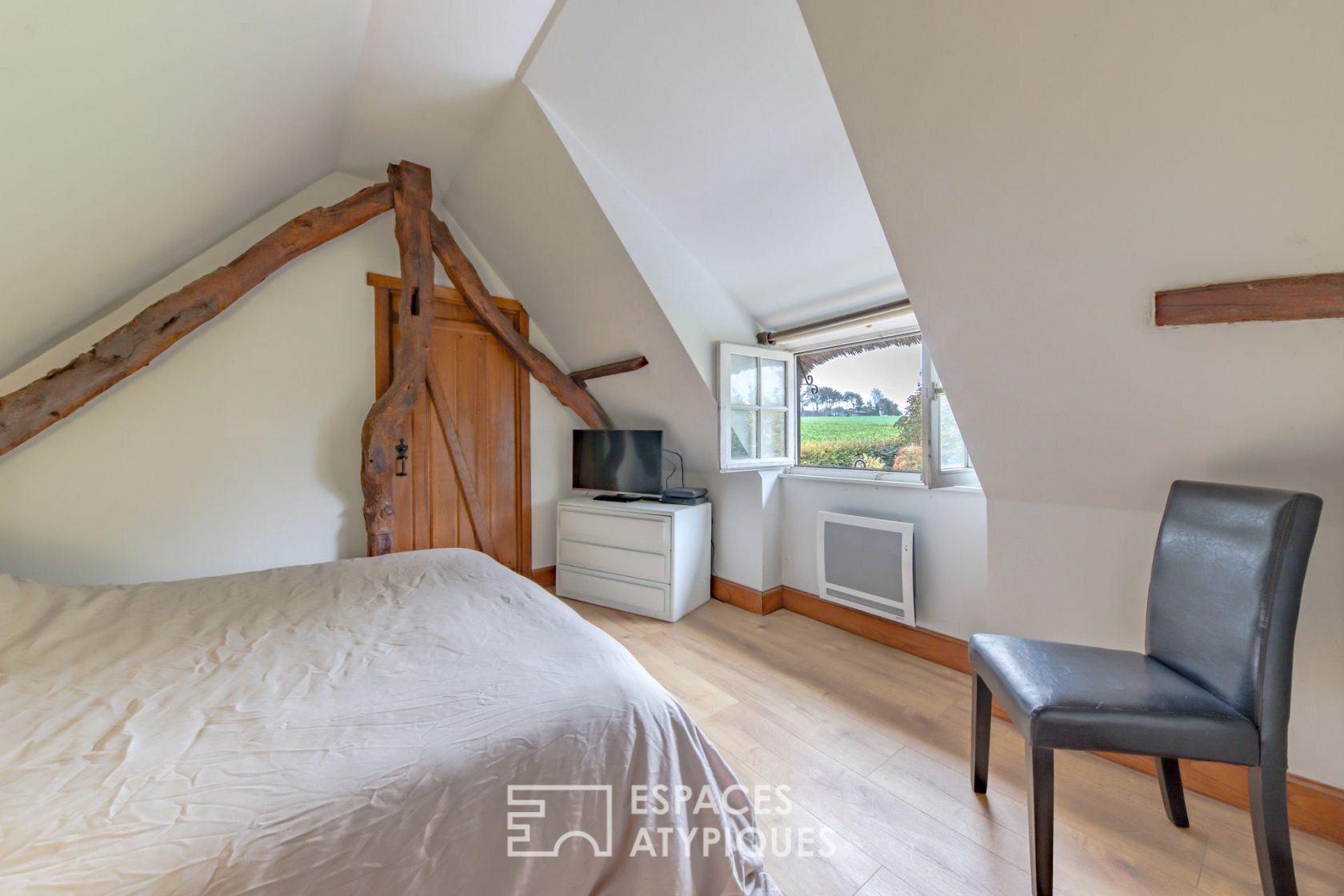 Authentic thatched cottage with its renovated cottage near the coast