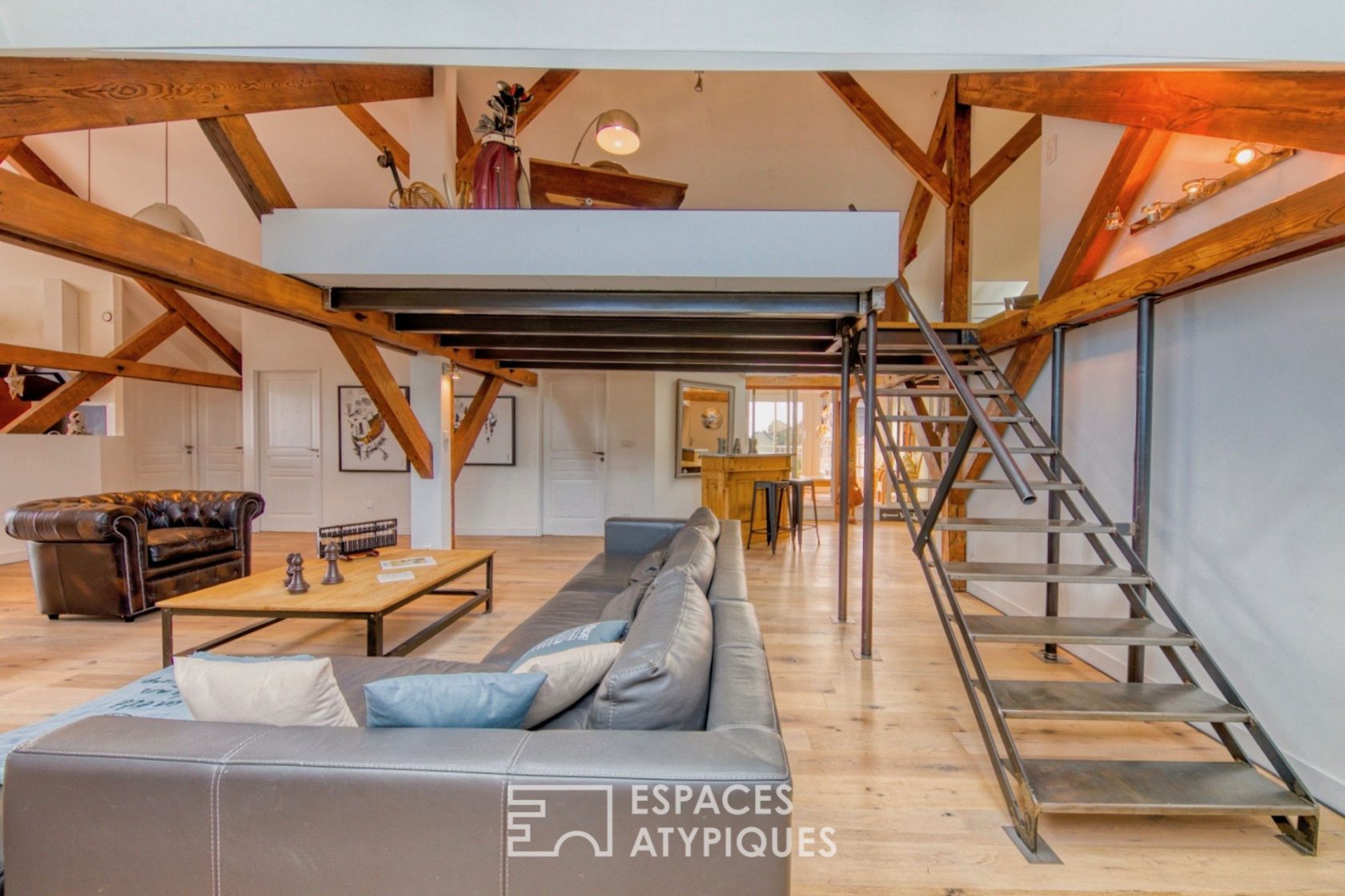 Contemporary loft under the eaves of an old port building