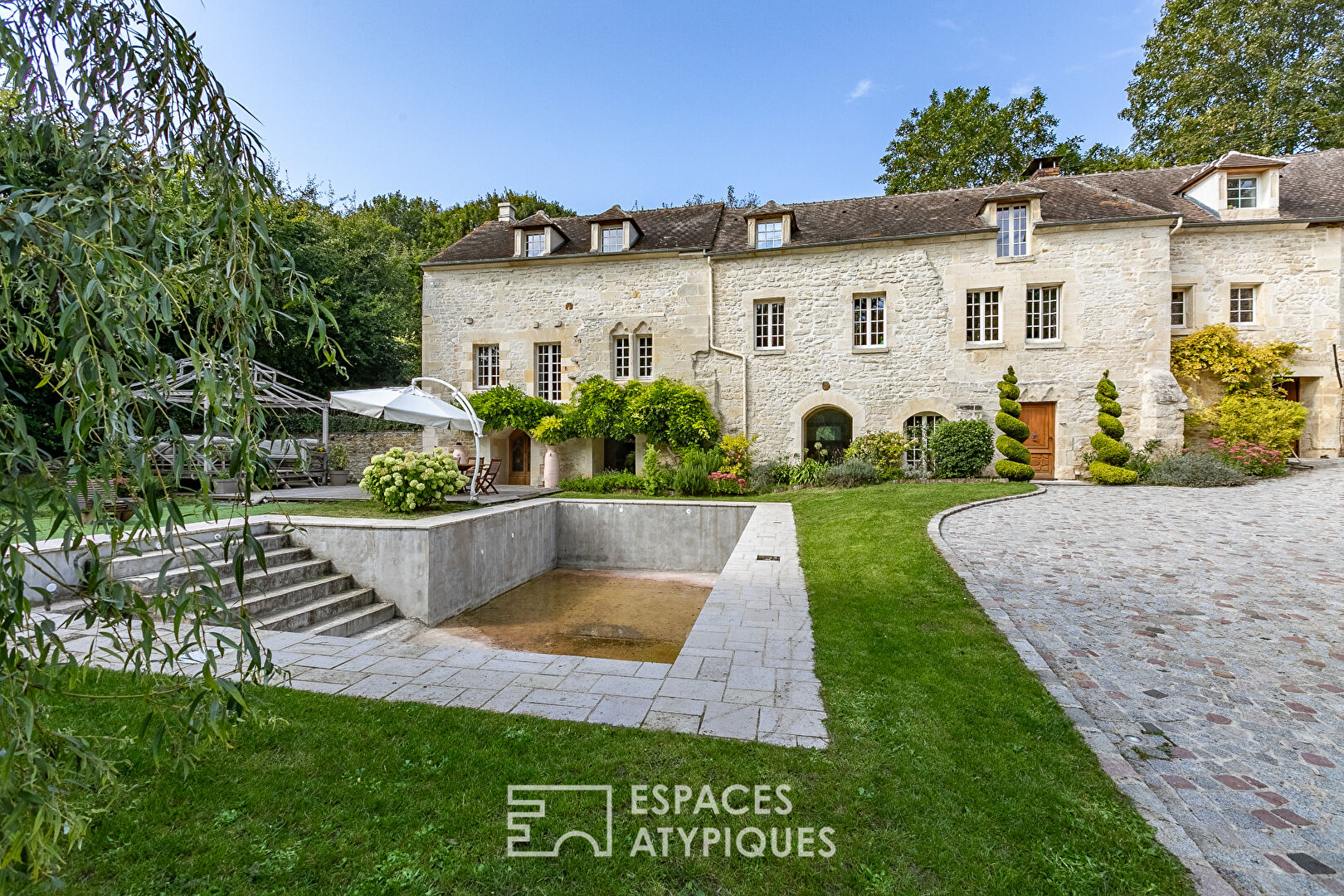 11th century abbey and its renovated outbuilding near Chantilly and Senlis