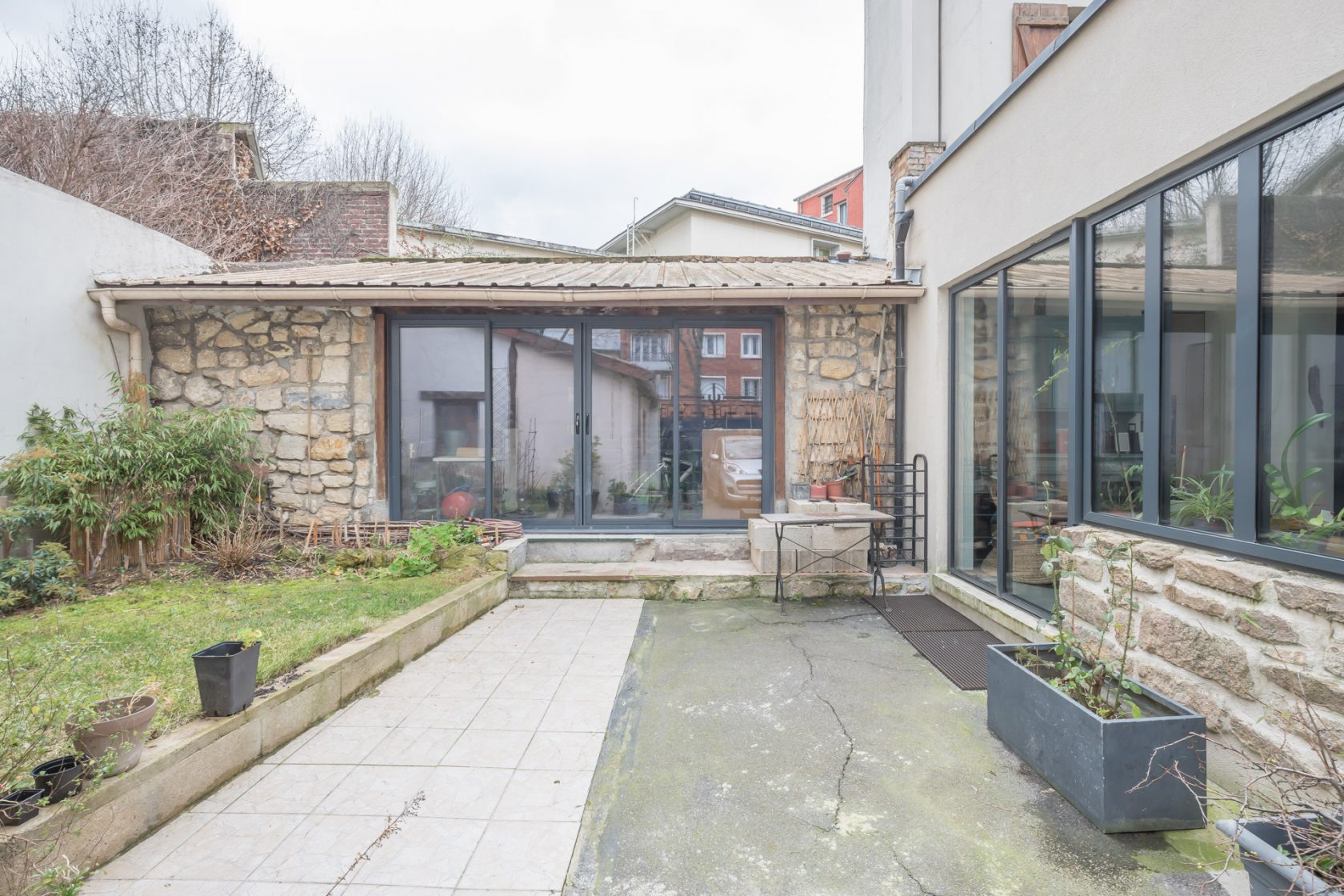 House with contemporary extension and garden