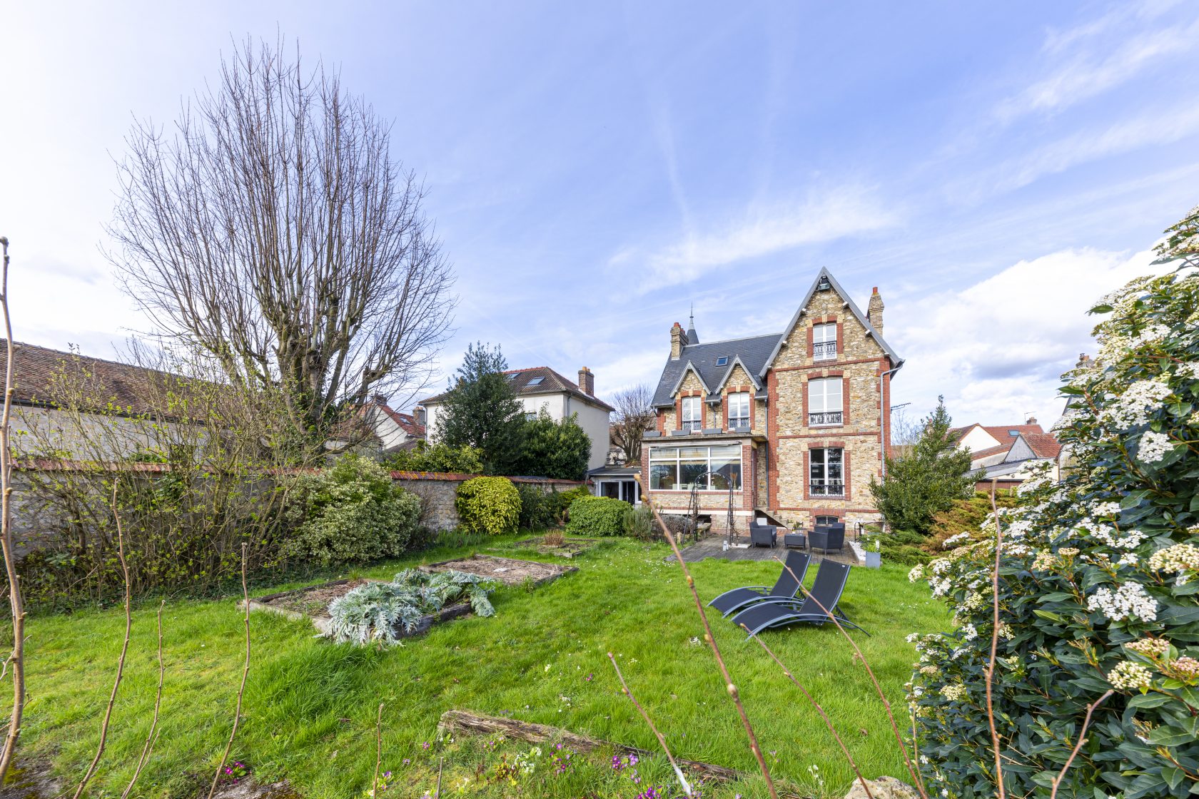 Turn of the century millstone with outbuildings and studio.