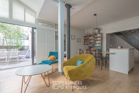 House/loft in a former printing works with terrace