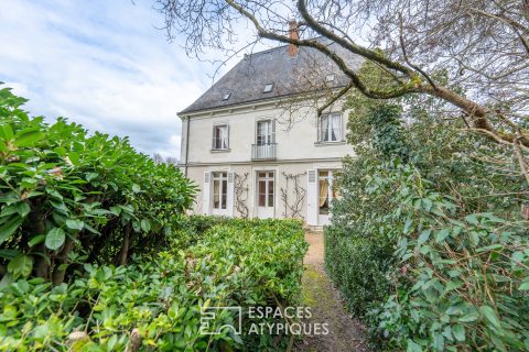 Historical property and its outbuildings with swimming pool.