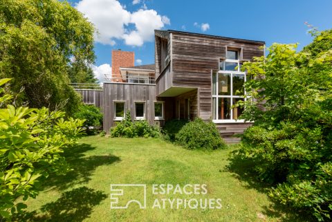 Maison d’architecte et son parc arboré au coeur du golf de Bruz