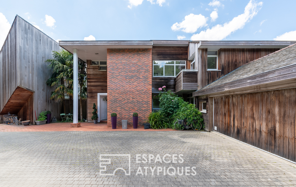 Maison d’architecte et son parc arboré au coeur du golf de Bruz