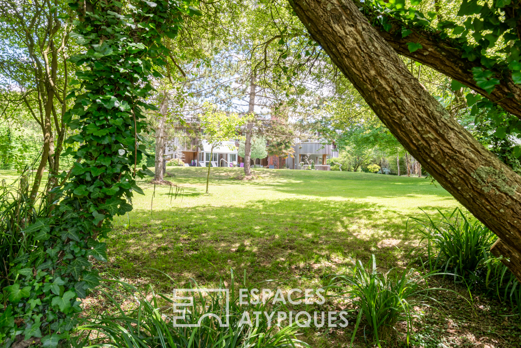 Maison d’architecte et son parc arboré au coeur du golf de Bruz