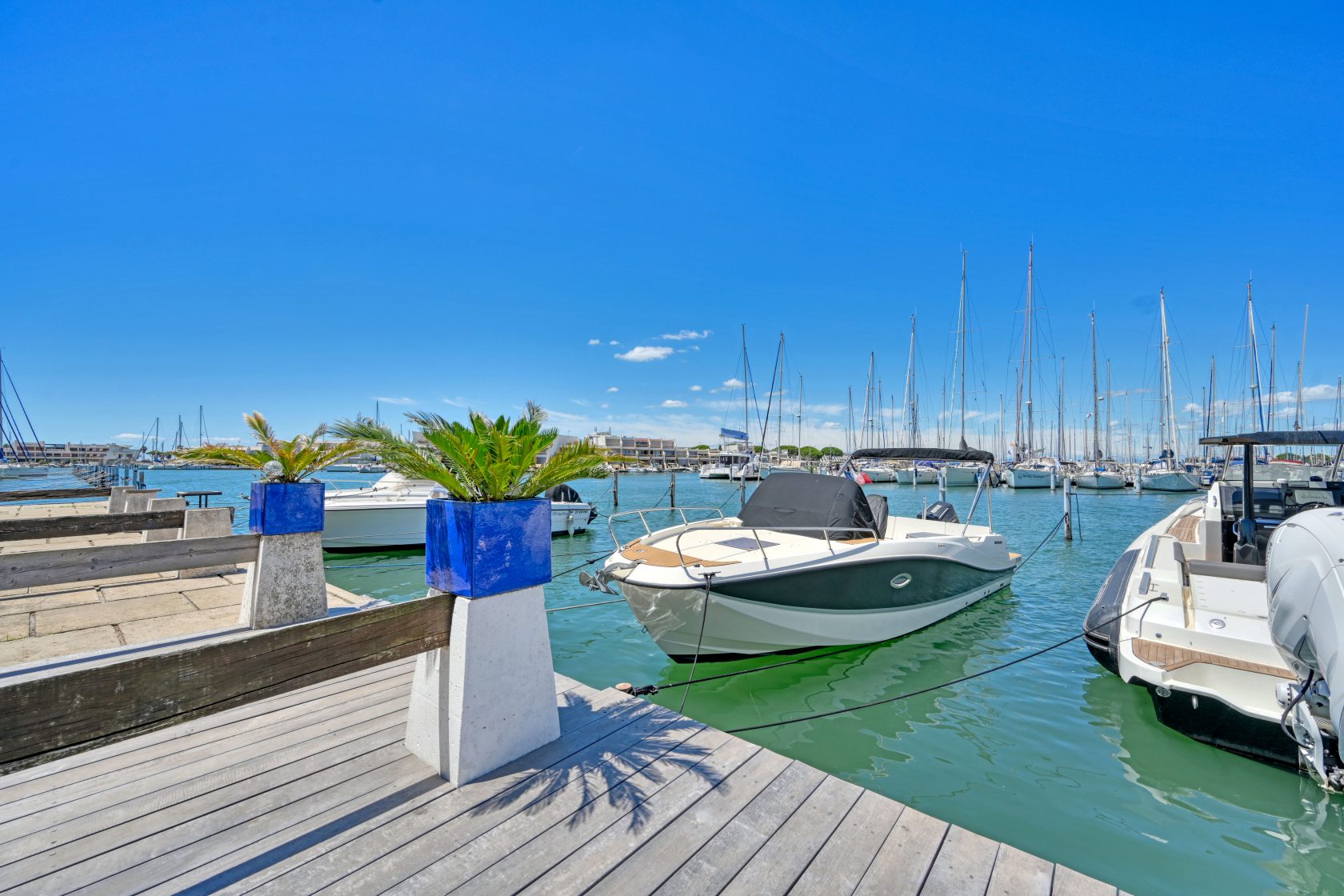 Magnificent marina with large terrace and jetty