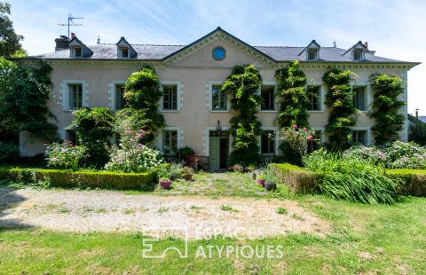 Bourgeois house in Talensac with outbuildings, wooded park and swimming pool