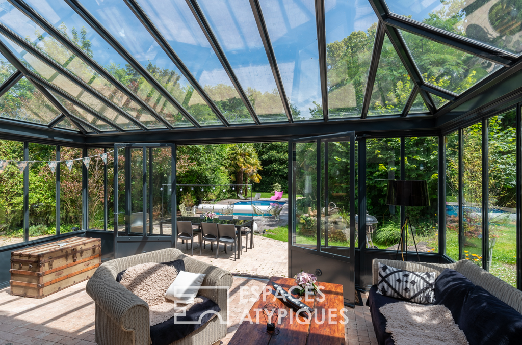 Bourgeois house in Talensac with outbuildings, wooded park and swimming pool