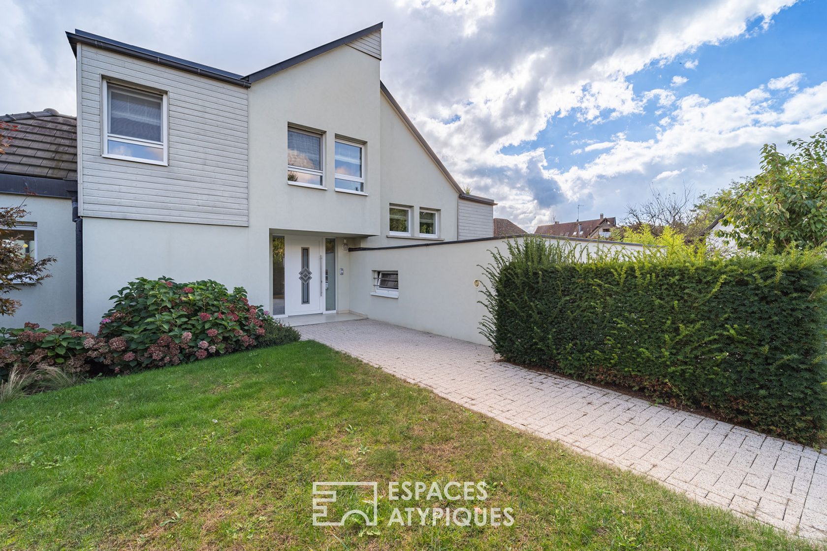 Architect-designed house with wooded garden