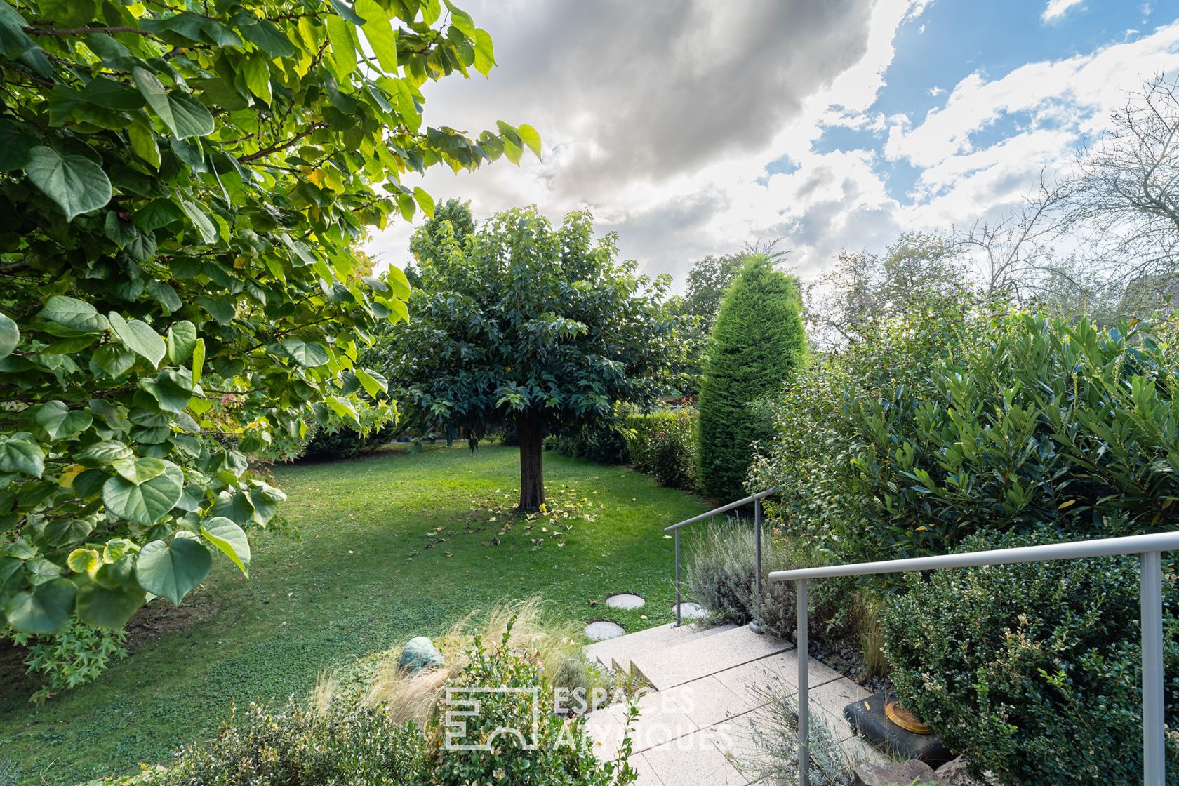 Architect-designed house with wooded garden