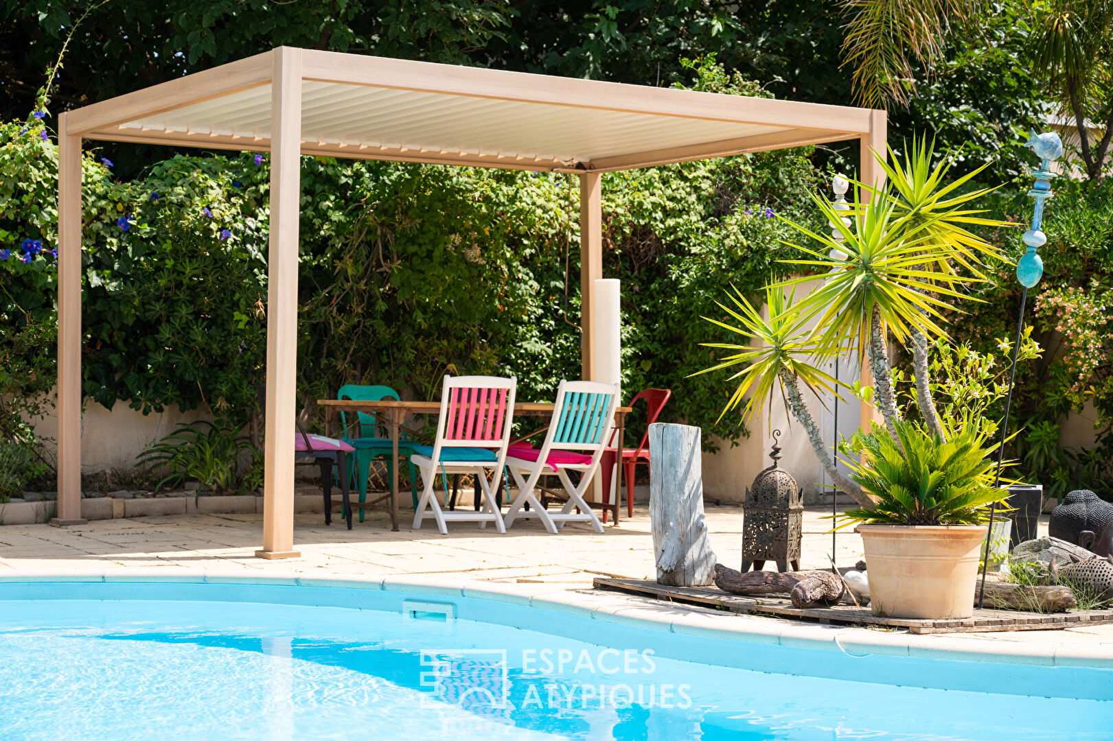 Appartement avec jardin et piscine en bord de plage