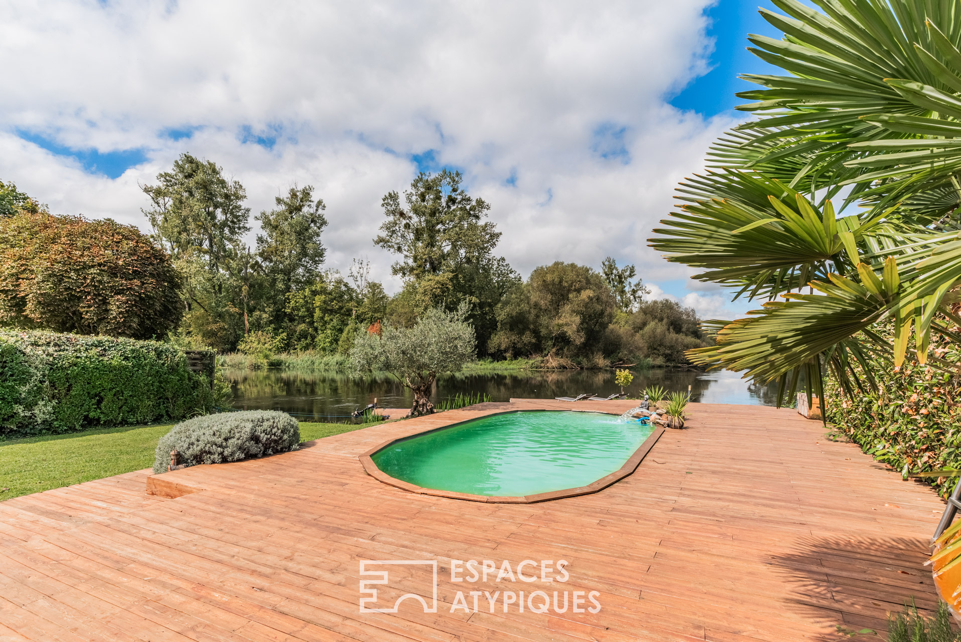 House with character and pool on the water’s edge