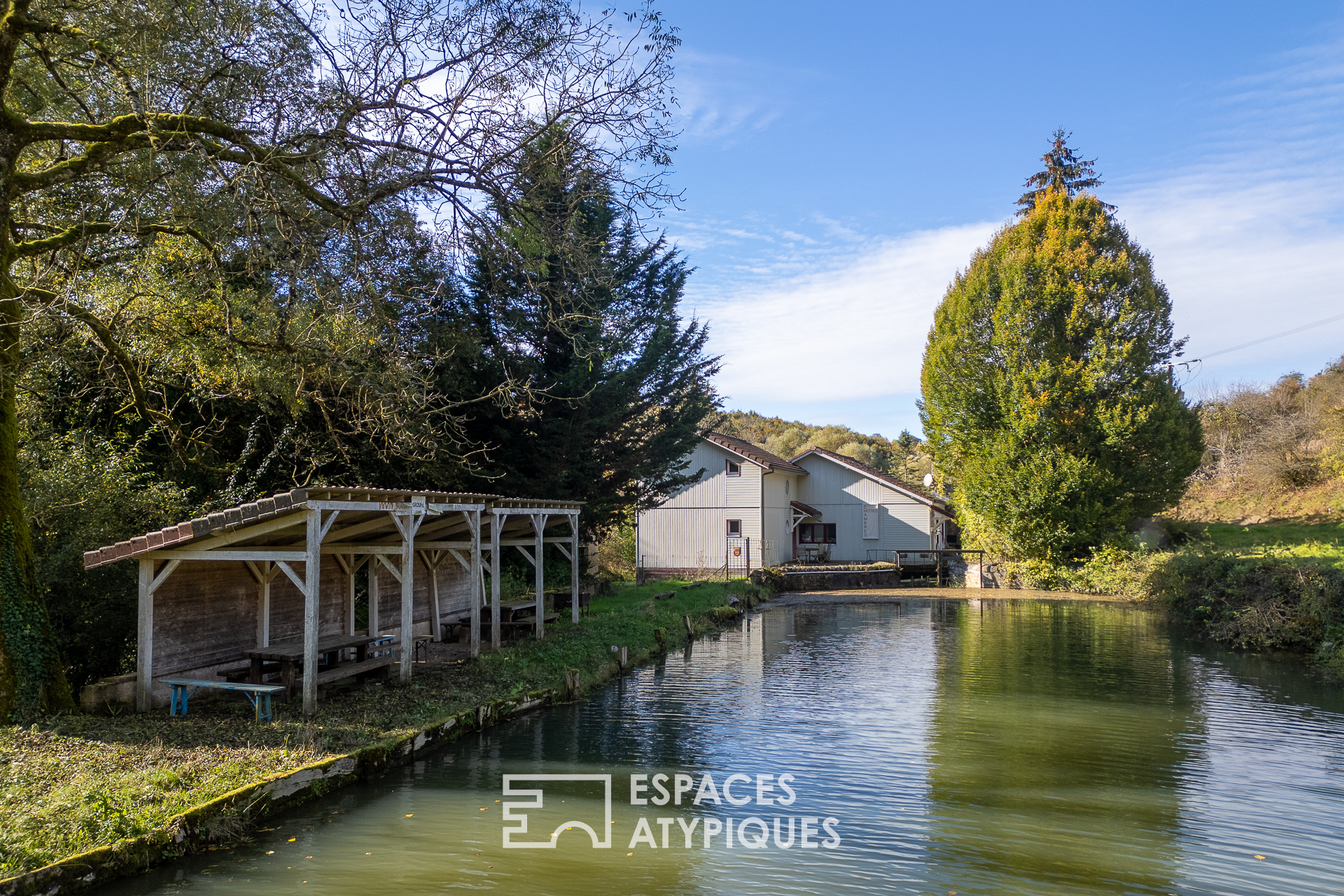 Charming mill and its verdant grounds