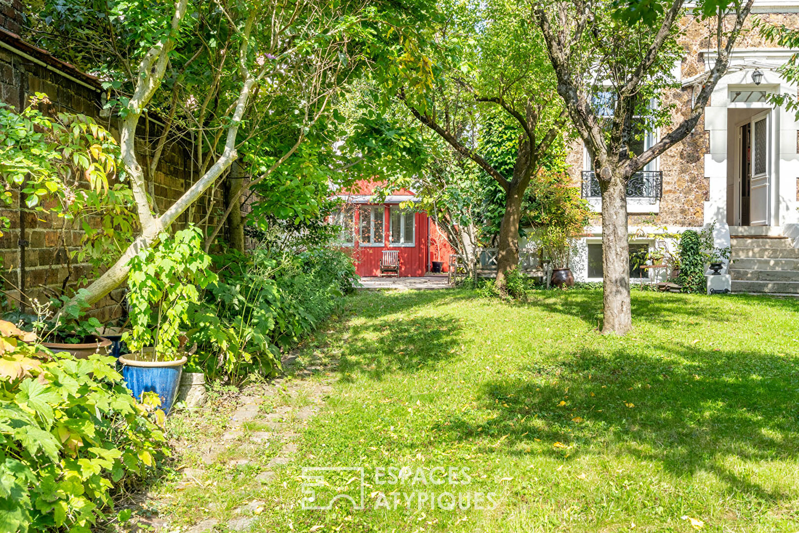 Character house with wooded garden