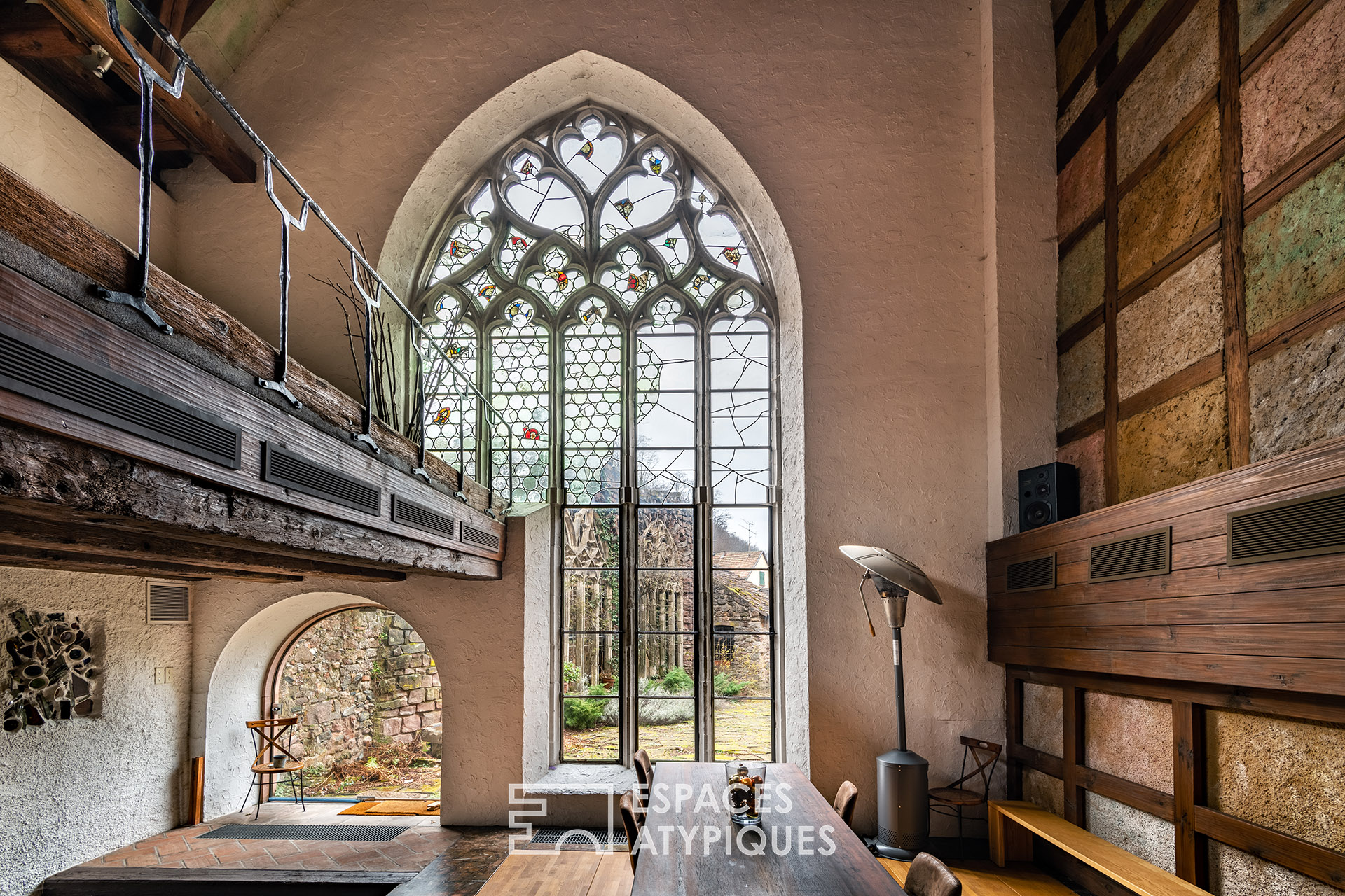 Former 17th century abbey and its fireplace Jacques Couëlle