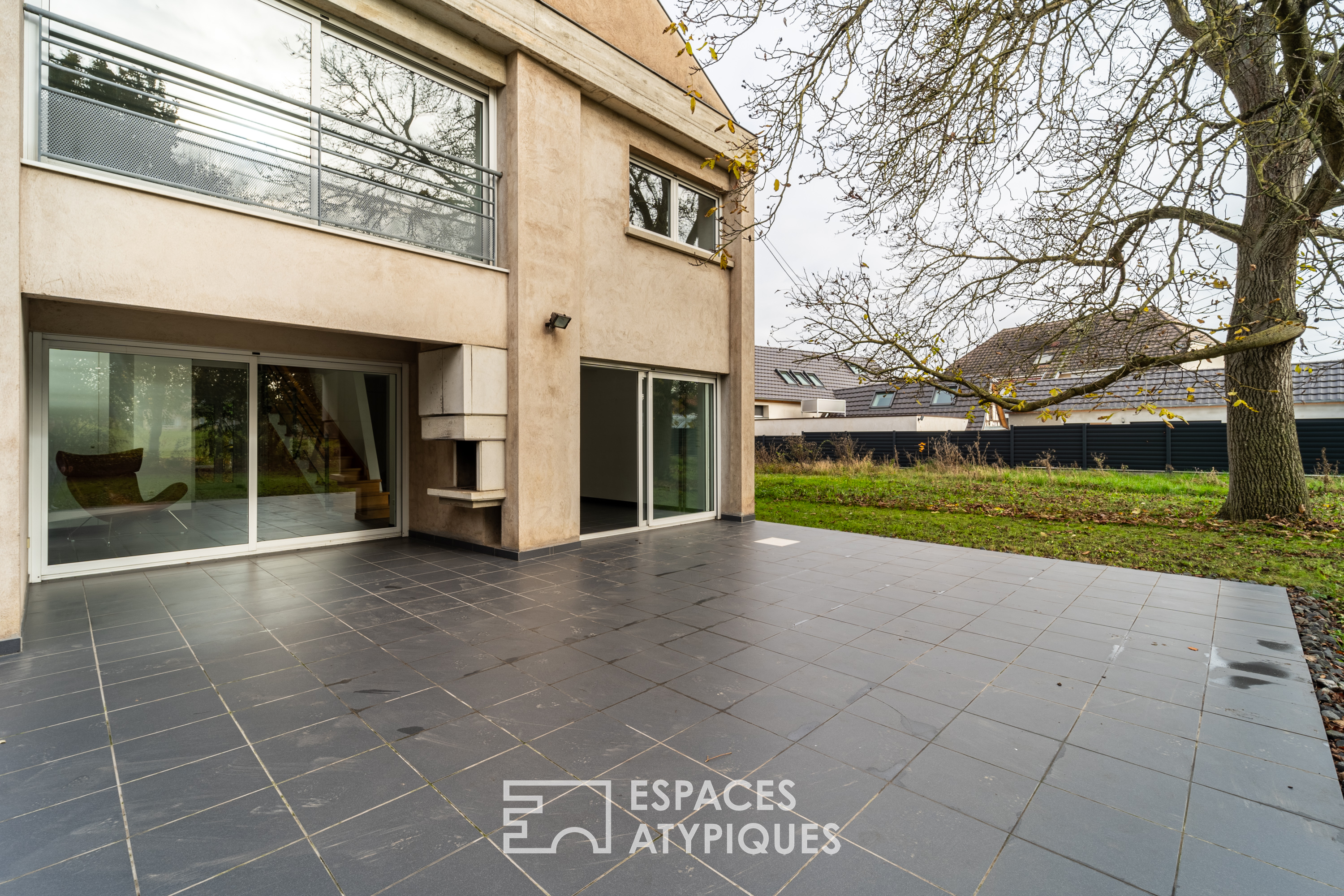 Brutalist-style architect-designed house with garden