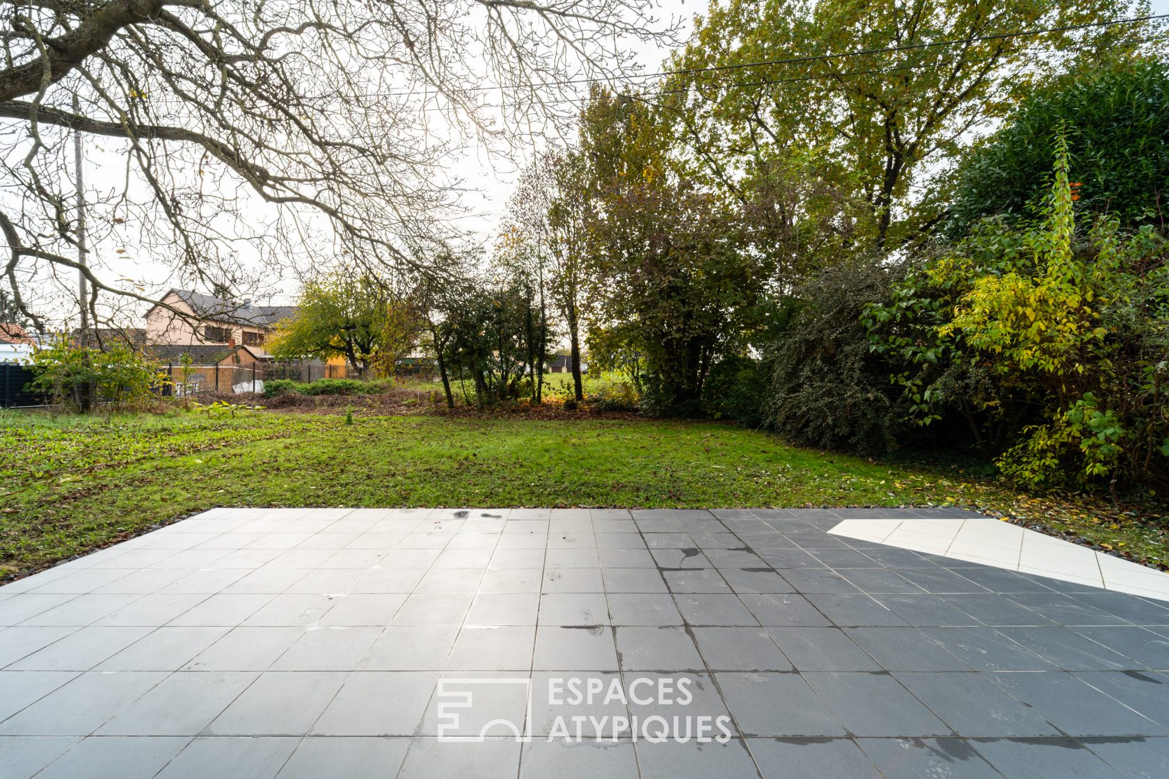 Brutalist-style architect-designed house with garden