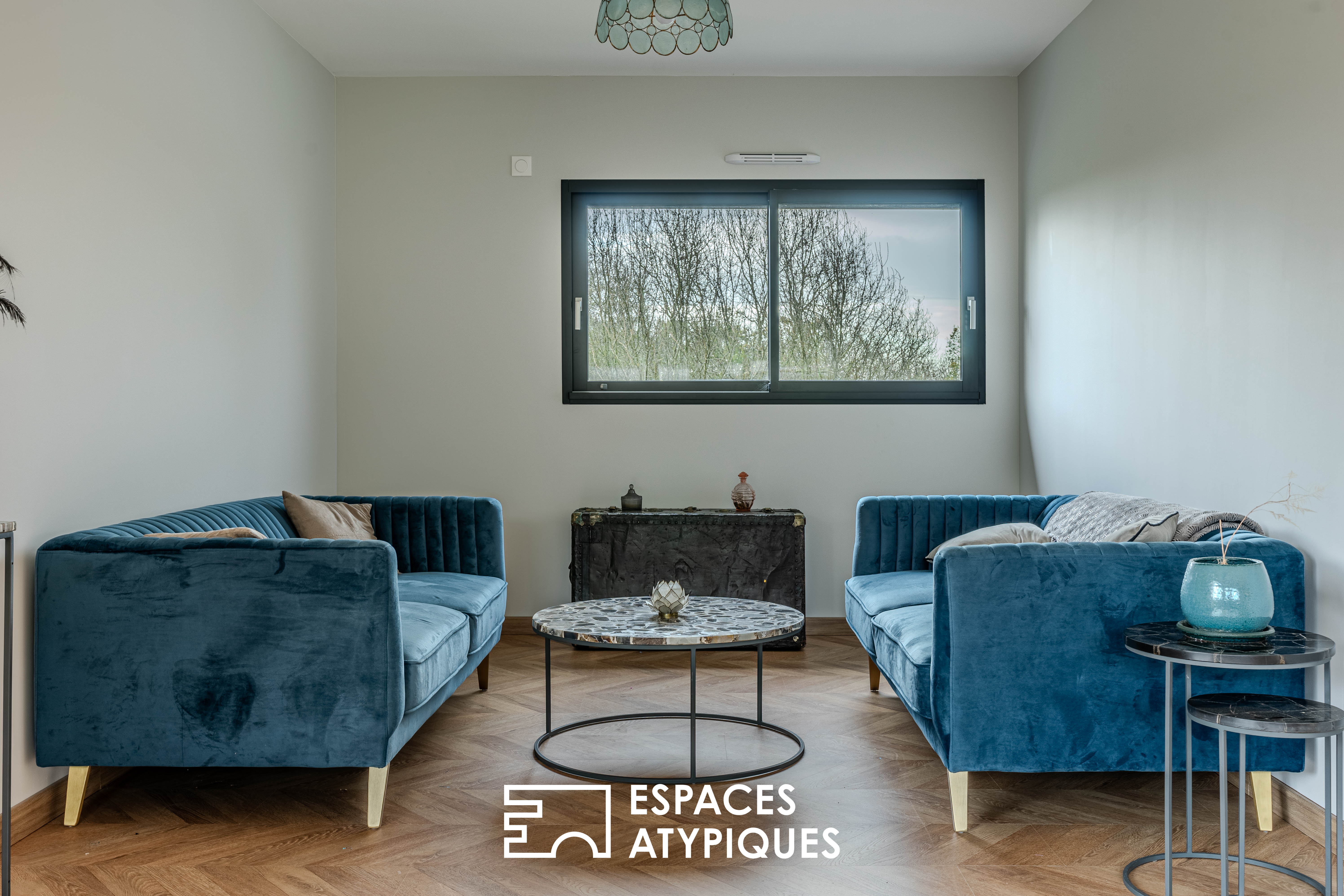 Maison familiale « éco-responsable » avec 5 chambres.