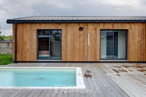 Maison en bois avec piscine