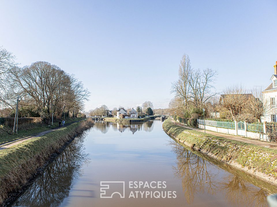 Maison de pêcheur au bord du canal