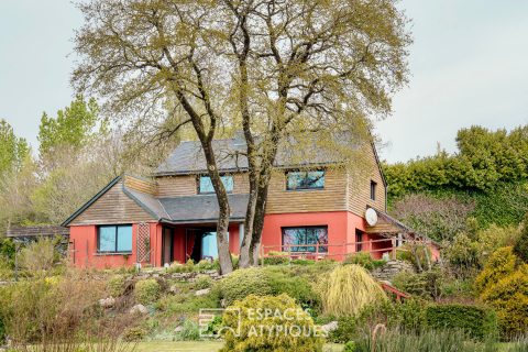 Propriété familiale nichée dans son parc  luxuriant