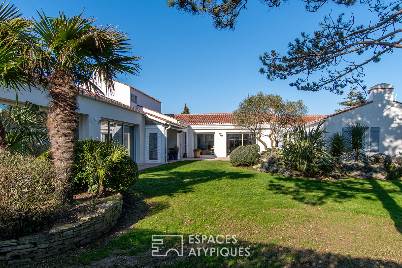 Architect’s house with garden and swimming pool near the ocean