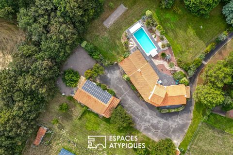 Propriété avec piscine dans son parc paysagé