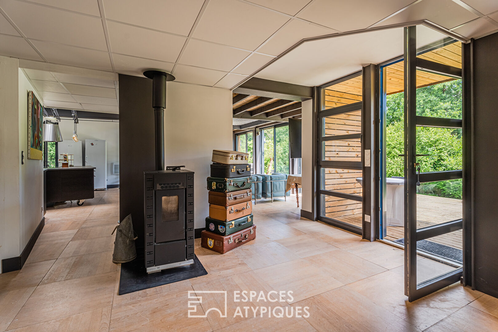 Maison d’Architecte ossature bois dans un écrin verdoyant