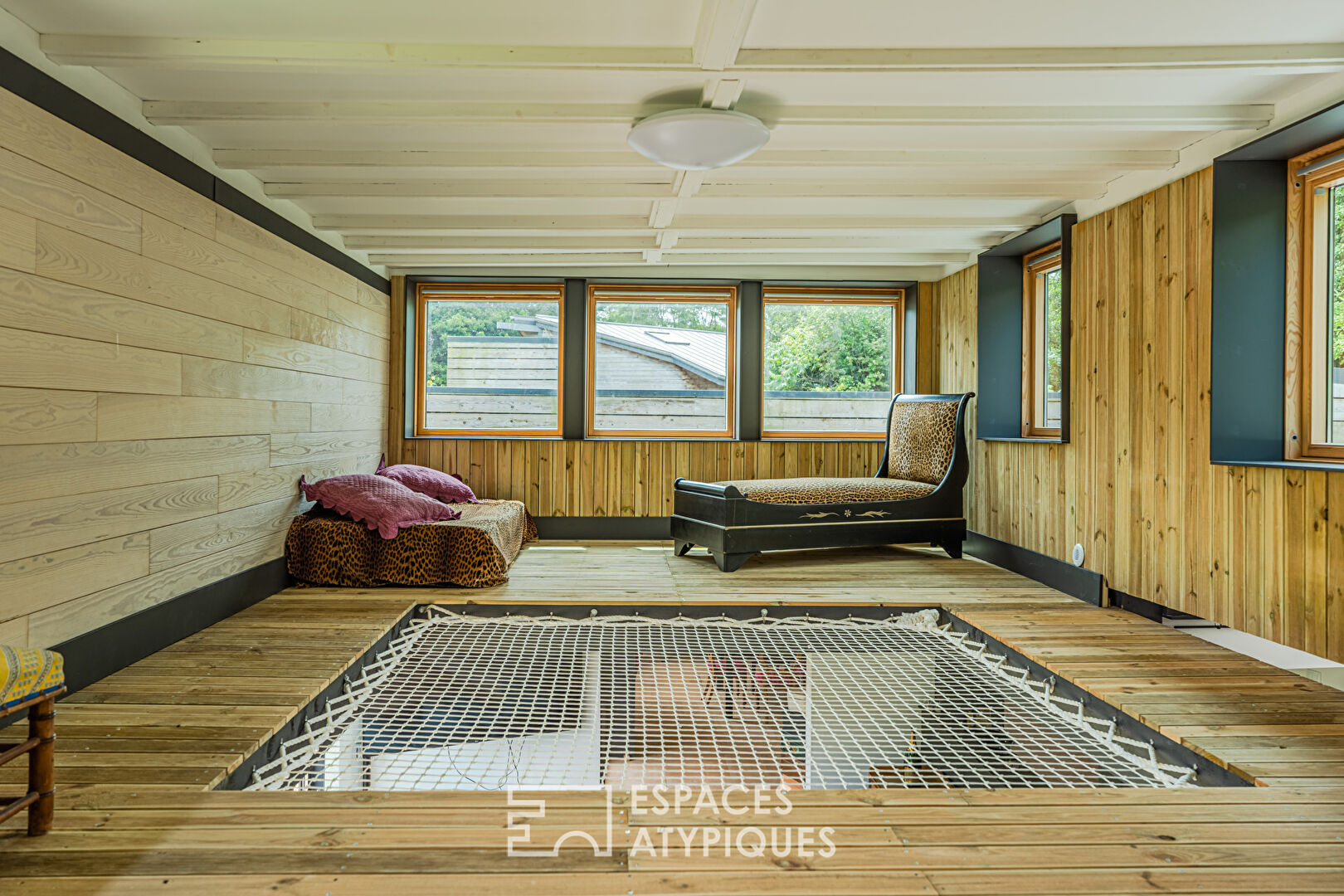 Maison d’Architecte ossature bois dans un écrin verdoyant