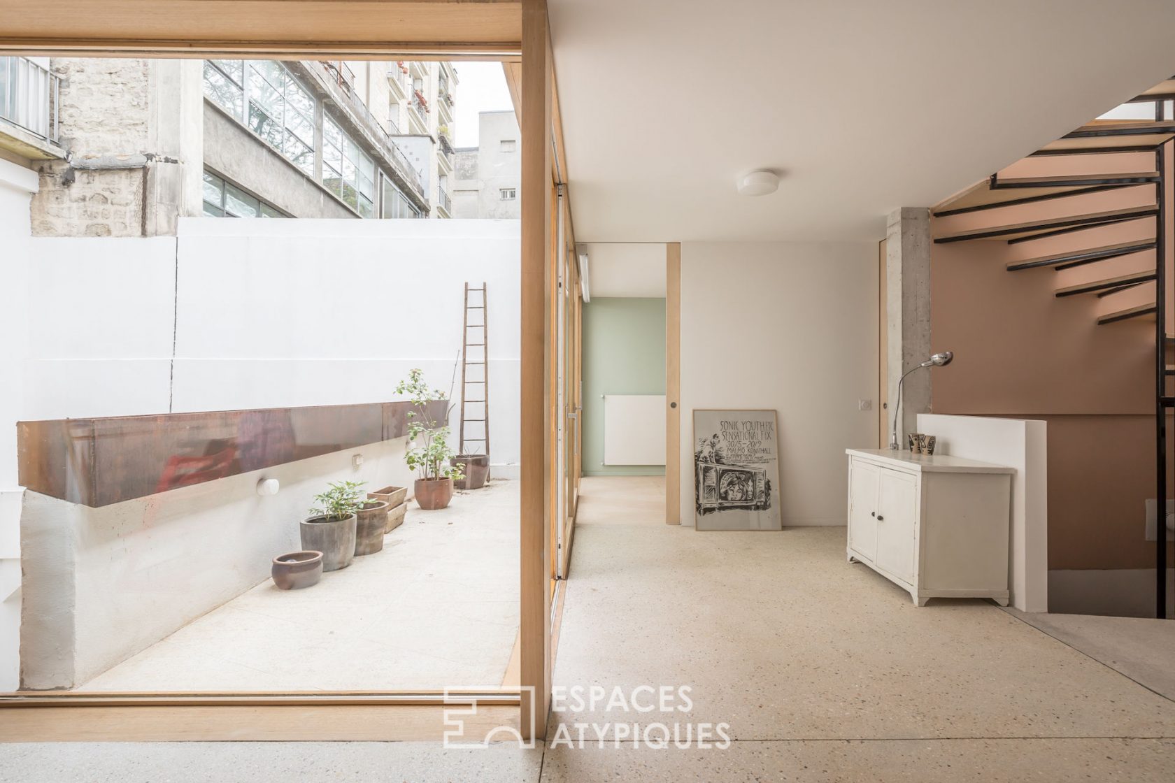 Duplex contemporain esprit maison avec terrasses