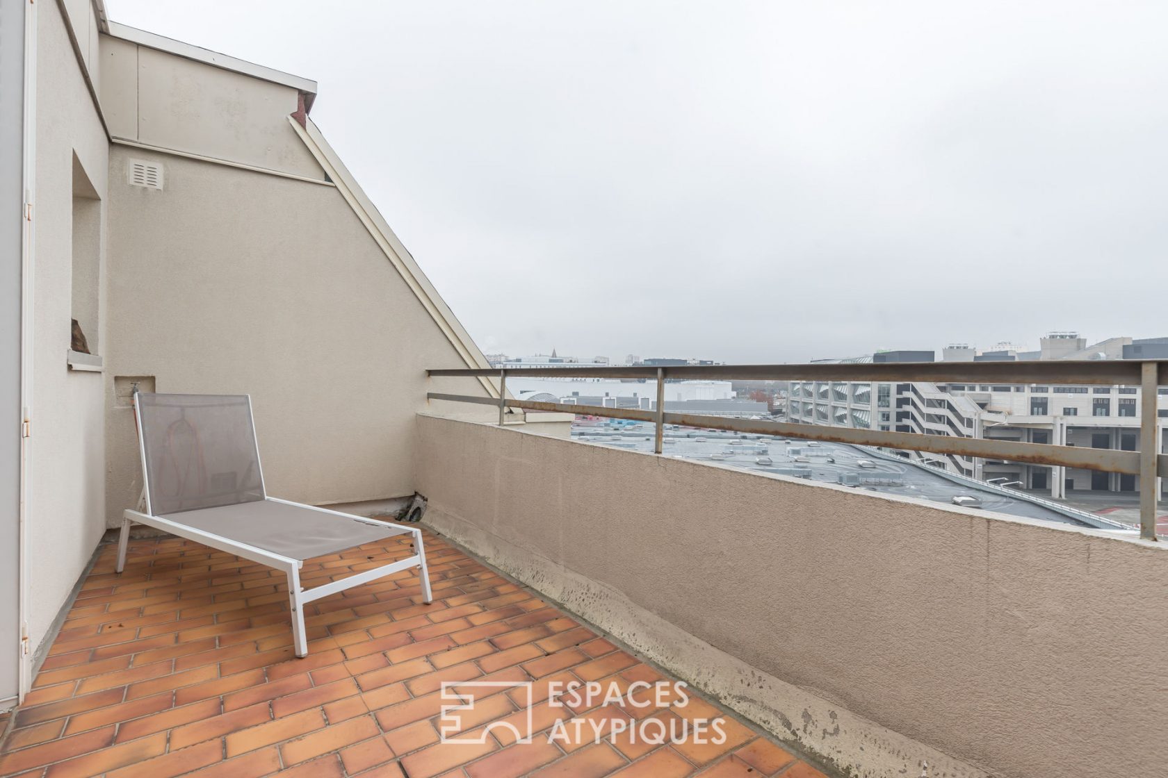 Duplex au dernier étage avec terrasses et vue sur Paris