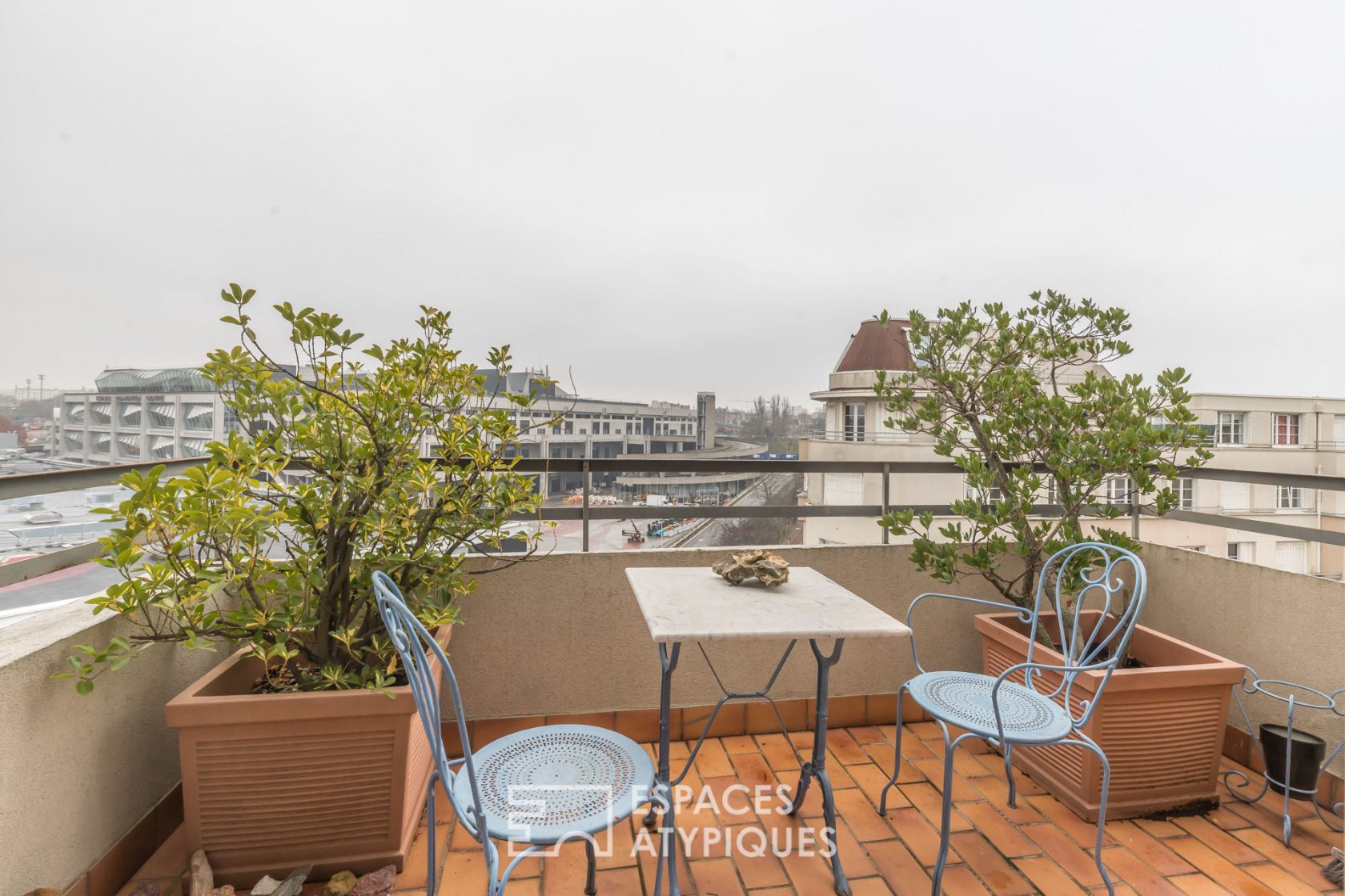 Top floor duplex with terraces and view of Paris