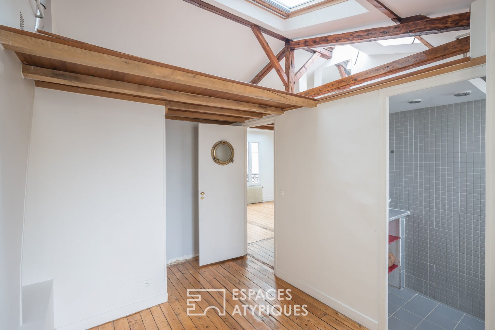Top floor under the roof with a mezzanine