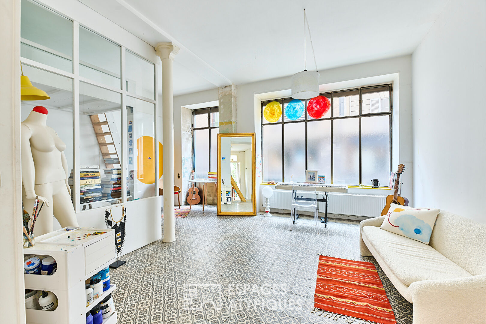 Artist’s loft in former grocery store in Château Rouge