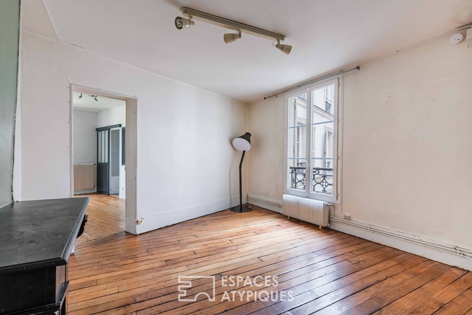 Appartement traversant sur cour à rafraîchir aux Batignolles