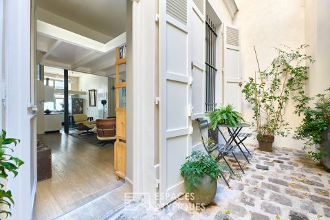 Loft-style apartment in Batignolles district