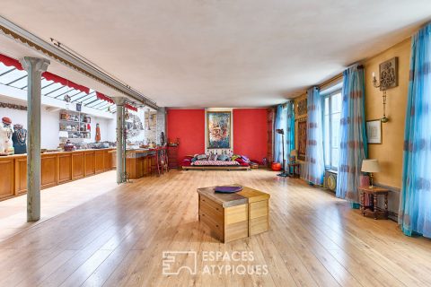 Former loft-style yoga room with balcony