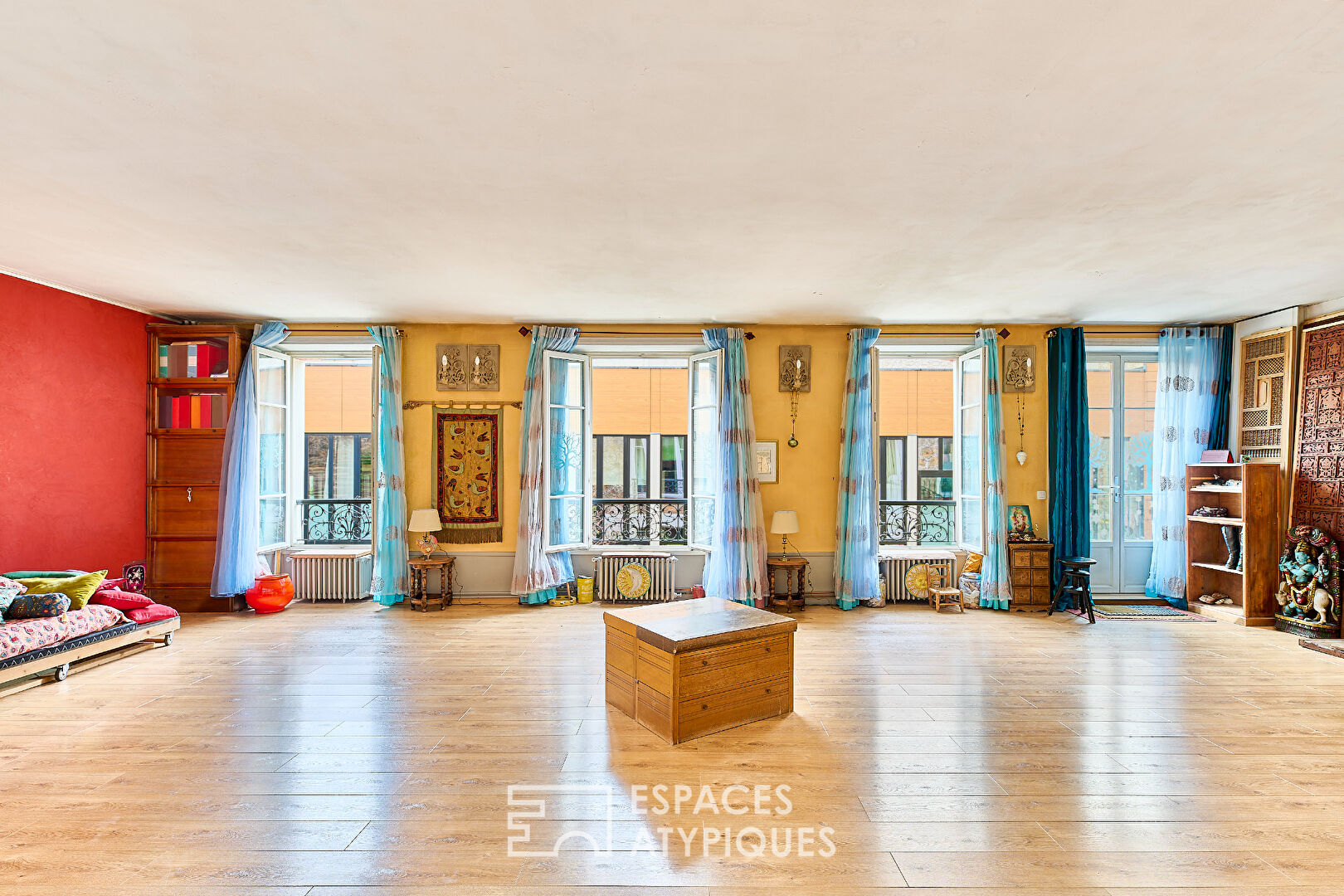 Former loft-style yoga room with balcony