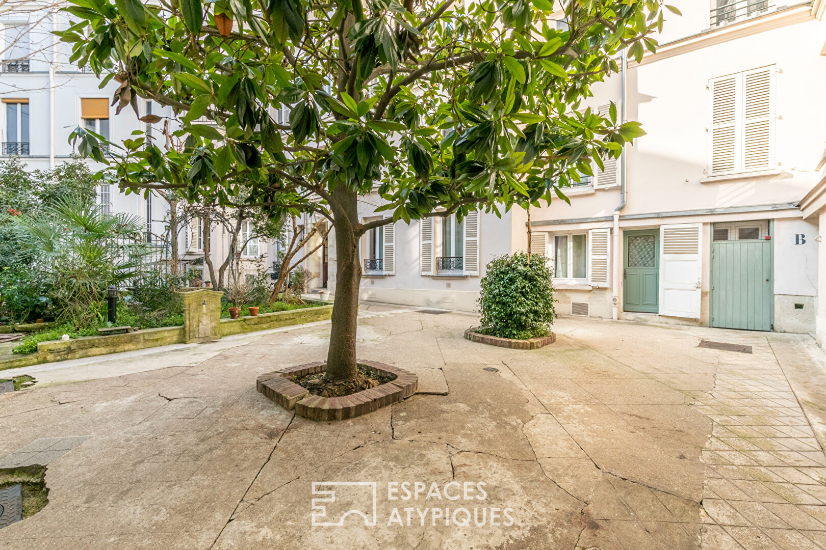 Appartement avec jardin privatif proche Square Montholon